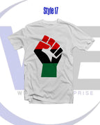 White t-shirt with a black power fist graphic in red, black, and green on a white background.